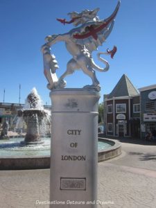 Dragon statue atop a pedestal base that reads City of London