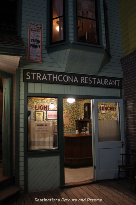 Restaurant at Manitoba Museum exhibit with a Permitted by Strike Committee sign in window