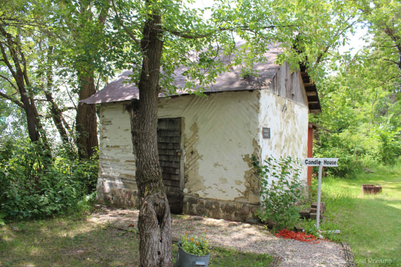 small rustic pioneer home mow in a museum