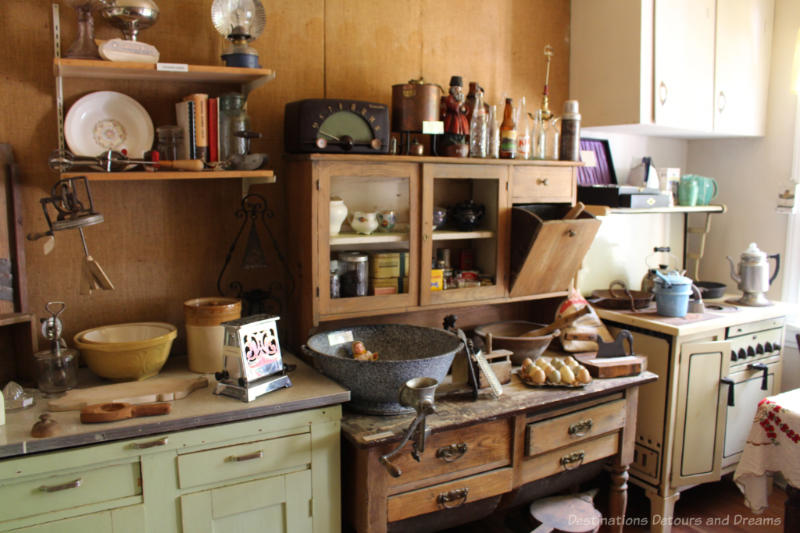 Wood food preparation and storage cabinets and old stove from an old kitchen