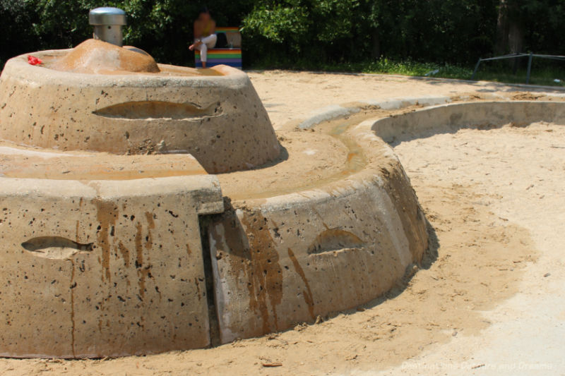 Sand and water play area in an outdoor playground