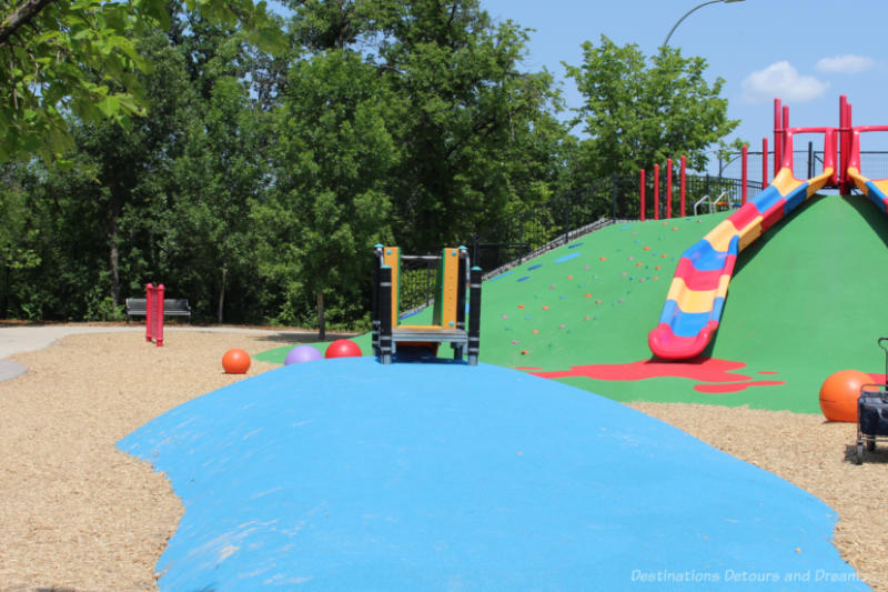 Slide on a fake hill in an outdoor playground