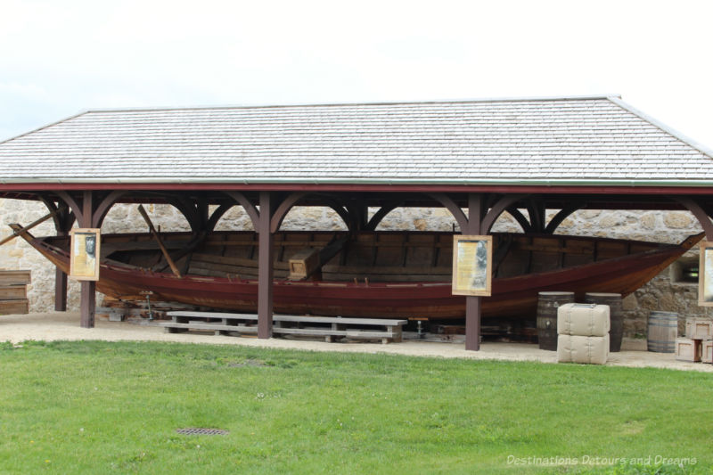 Replica of a York boat stored under a protective roof