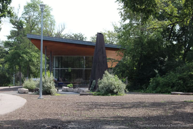 park pavilion building with overhanging sloped roof