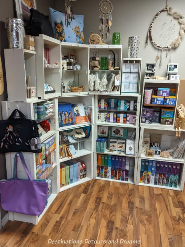 White shelves contains items for sale in museum store