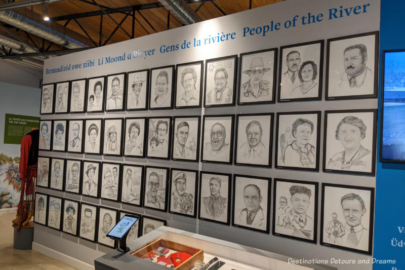 A wall of drawings of 43 people being featured in a museum