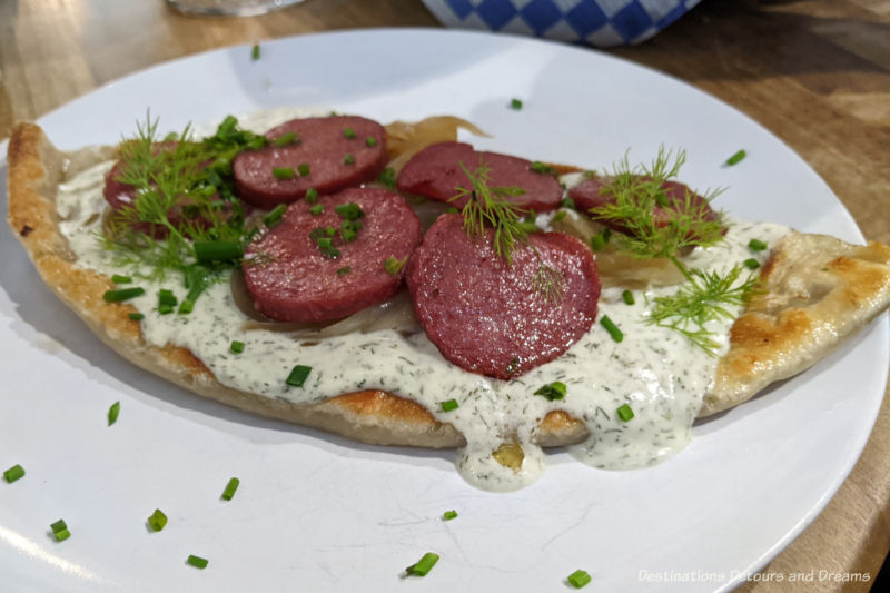 Handmade XL smoked gouda and potato Perogy with dill cream and kielbasa