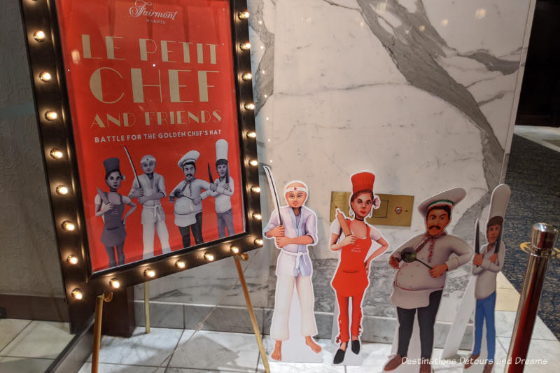 Poster at entrance to restaurant advertising Le Petit Chef and Friends