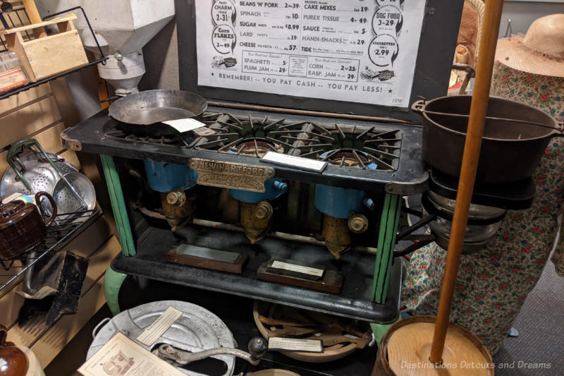 An antique kerosene stove on display in a museum